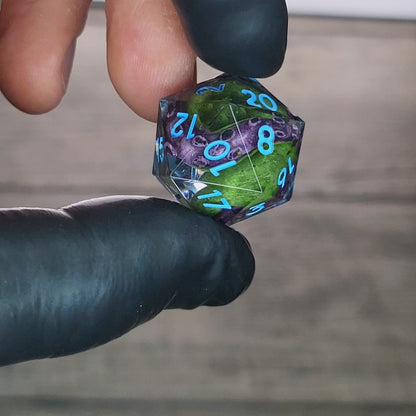 D20 dice with green tentacles inside and blue numbers for play dnd , dungeons and dragons , Call of Cthulhu