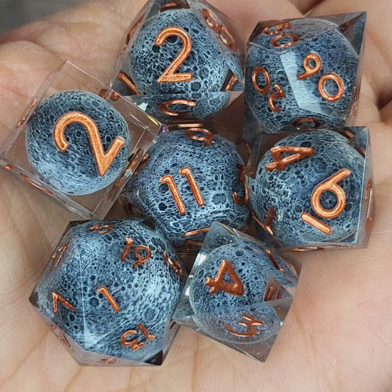 Dice set with moon inside and bronze numbers for play dnd , dungeons and dragons