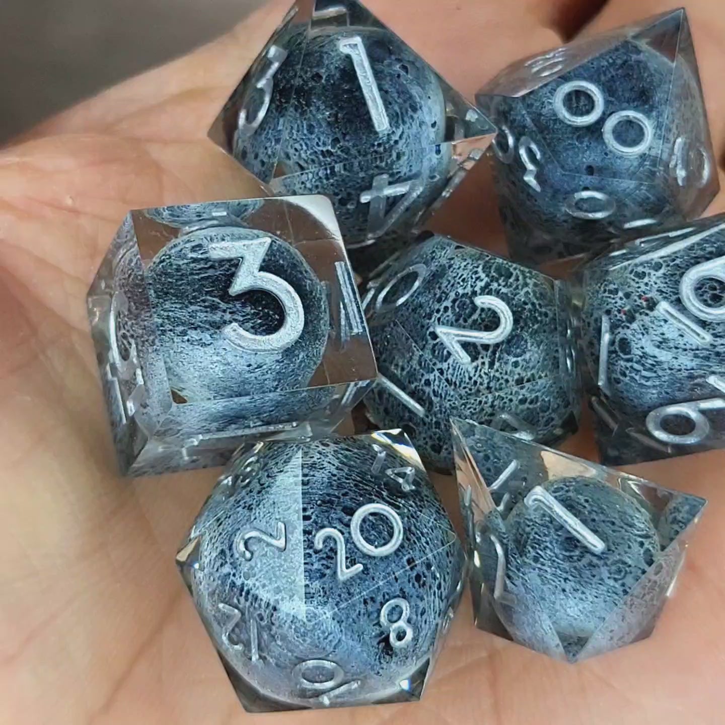 Dice set with moon inside and silver numbers for play dnd , dungeons and dragons